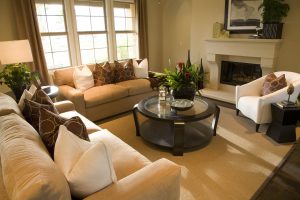 A sunny and elegant living room with new replacement windows. 
